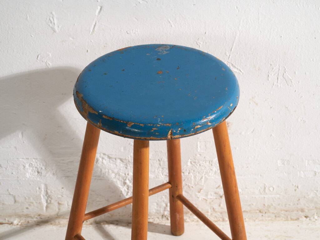 Antique wooden stool with a round seat – Central Europe, around 1950