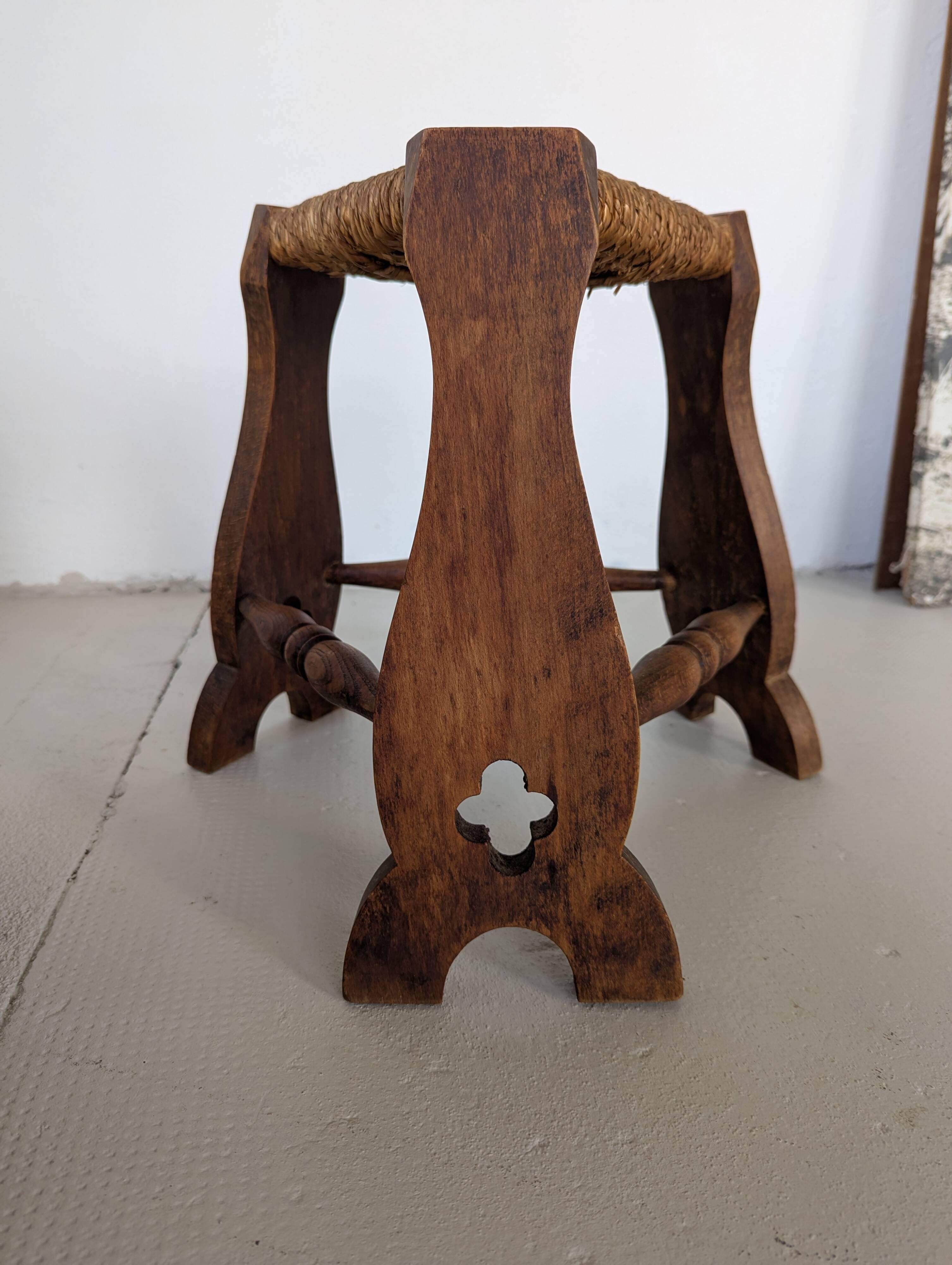 Low tripod farm stool in wood and straw