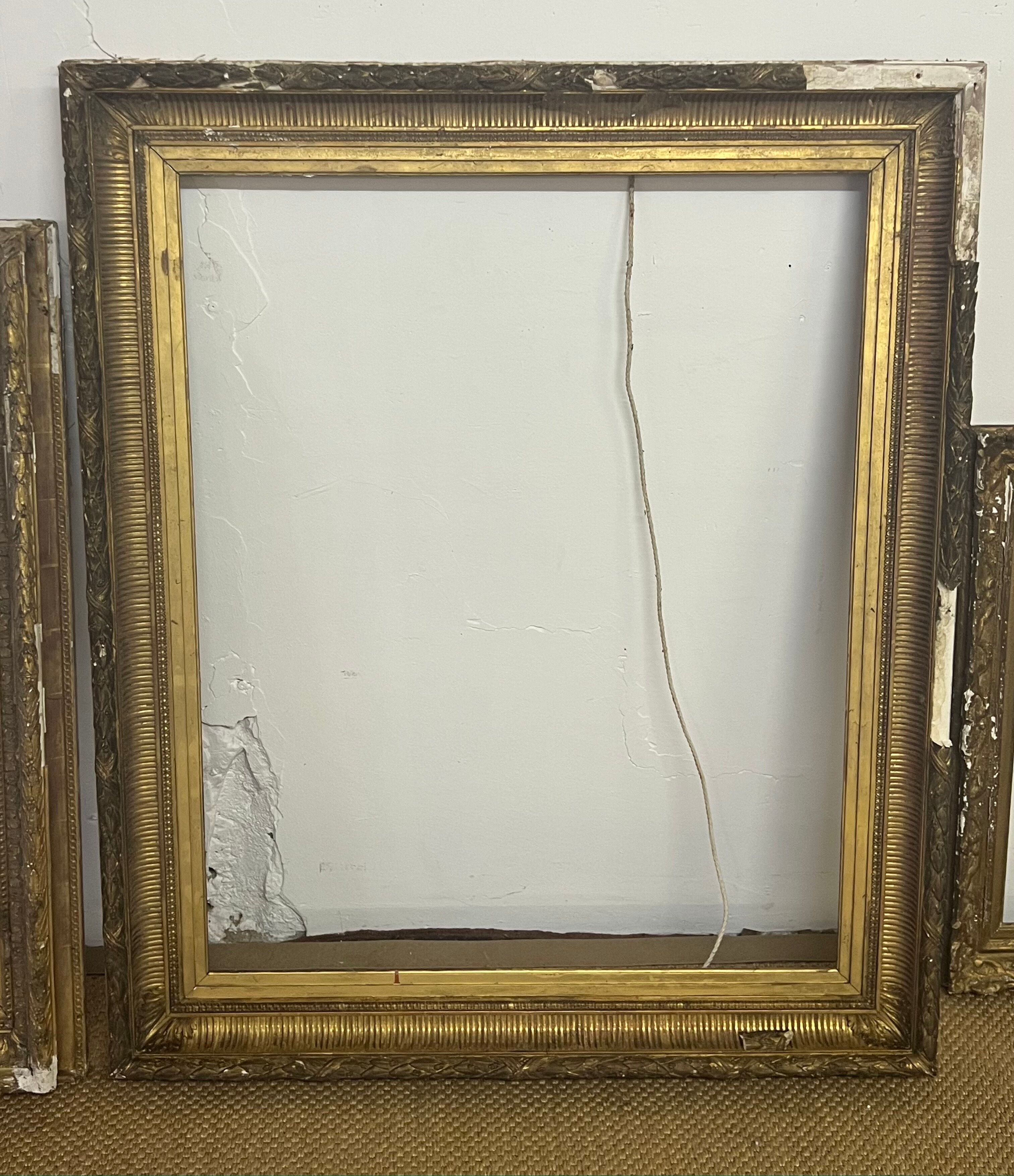 Set of 3 period frames in wood and gilded stucco