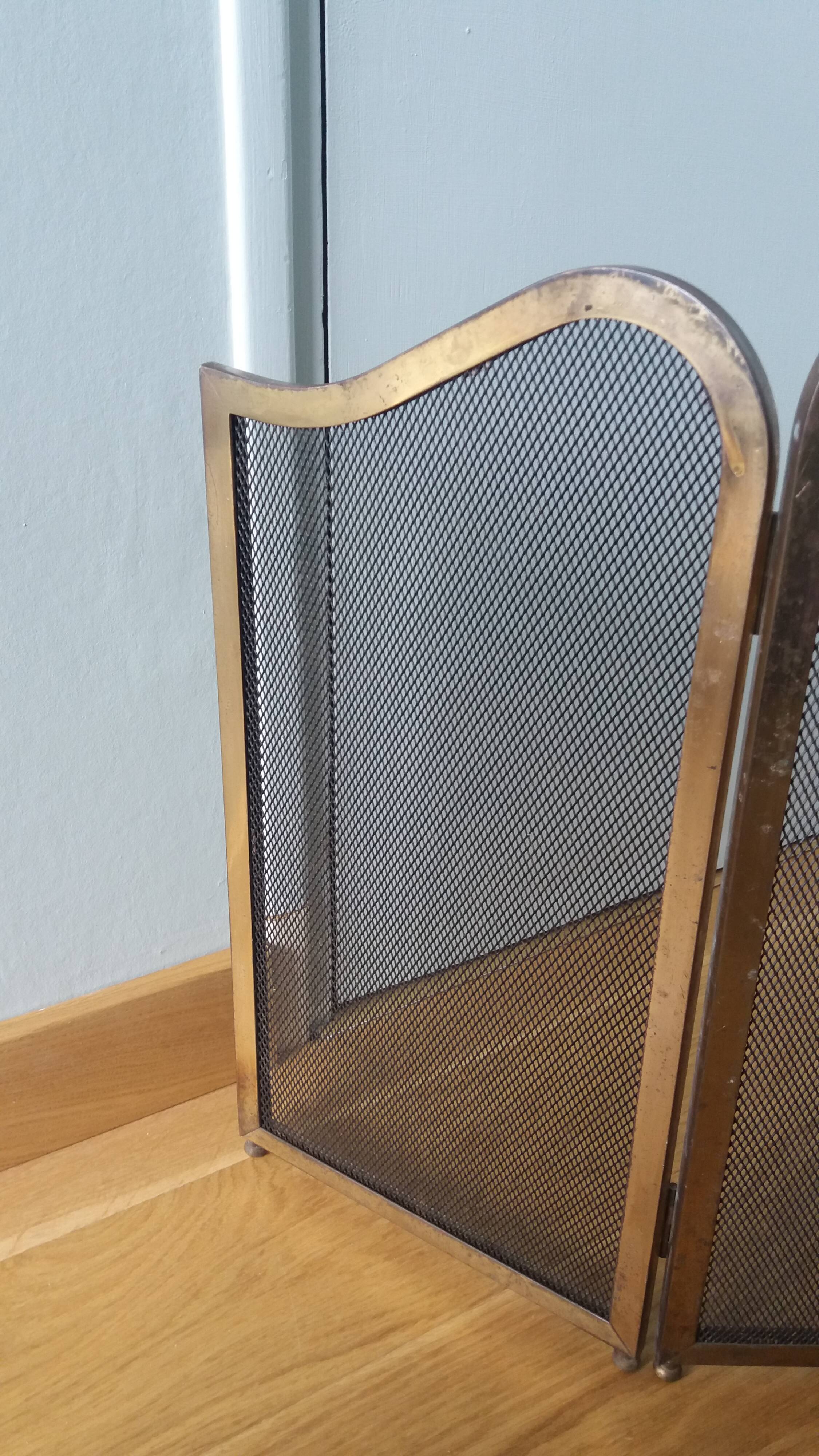 Fire screen, three-panel fireplace screen.