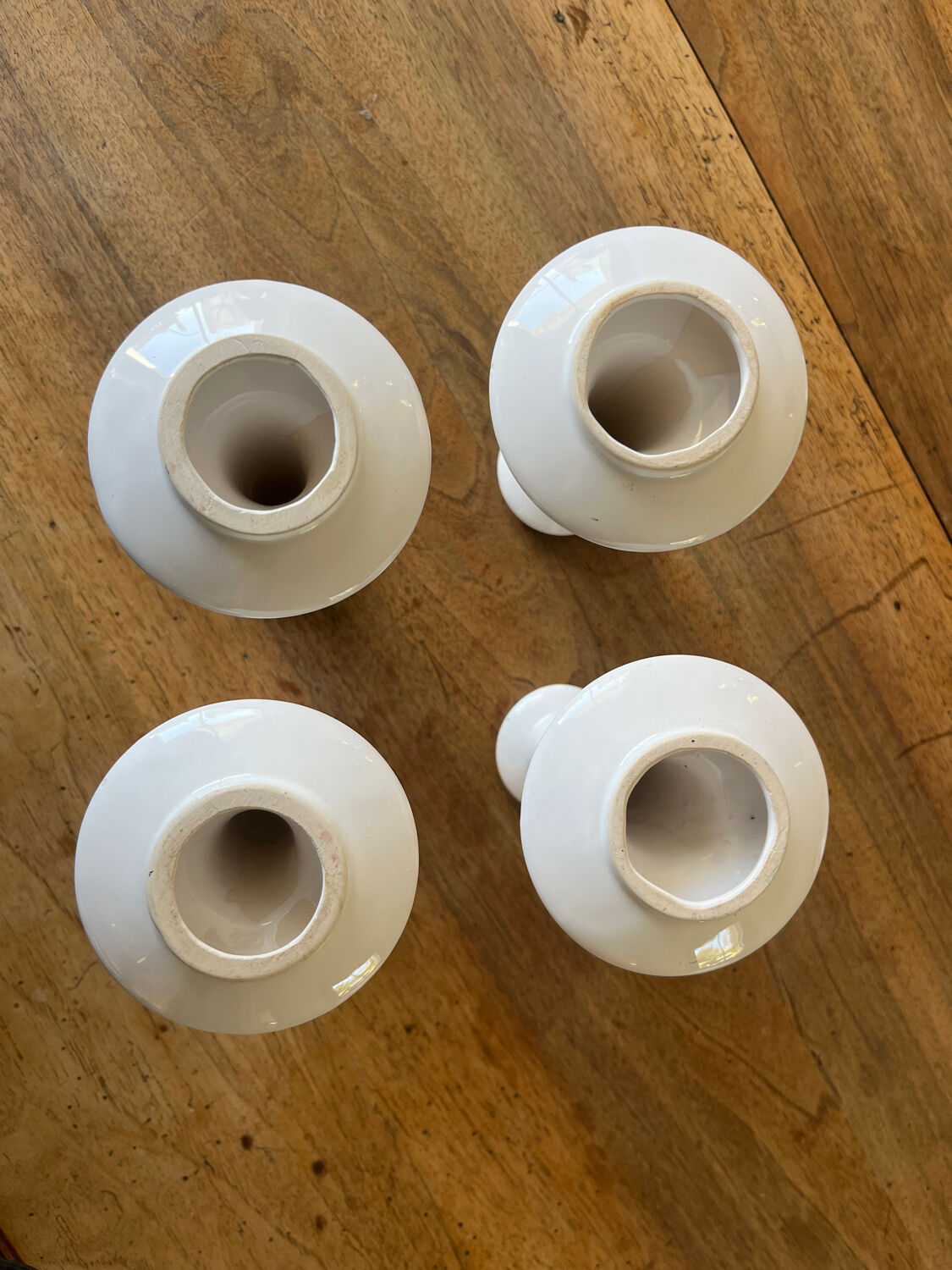 Set of 4 white ceramic candle holders