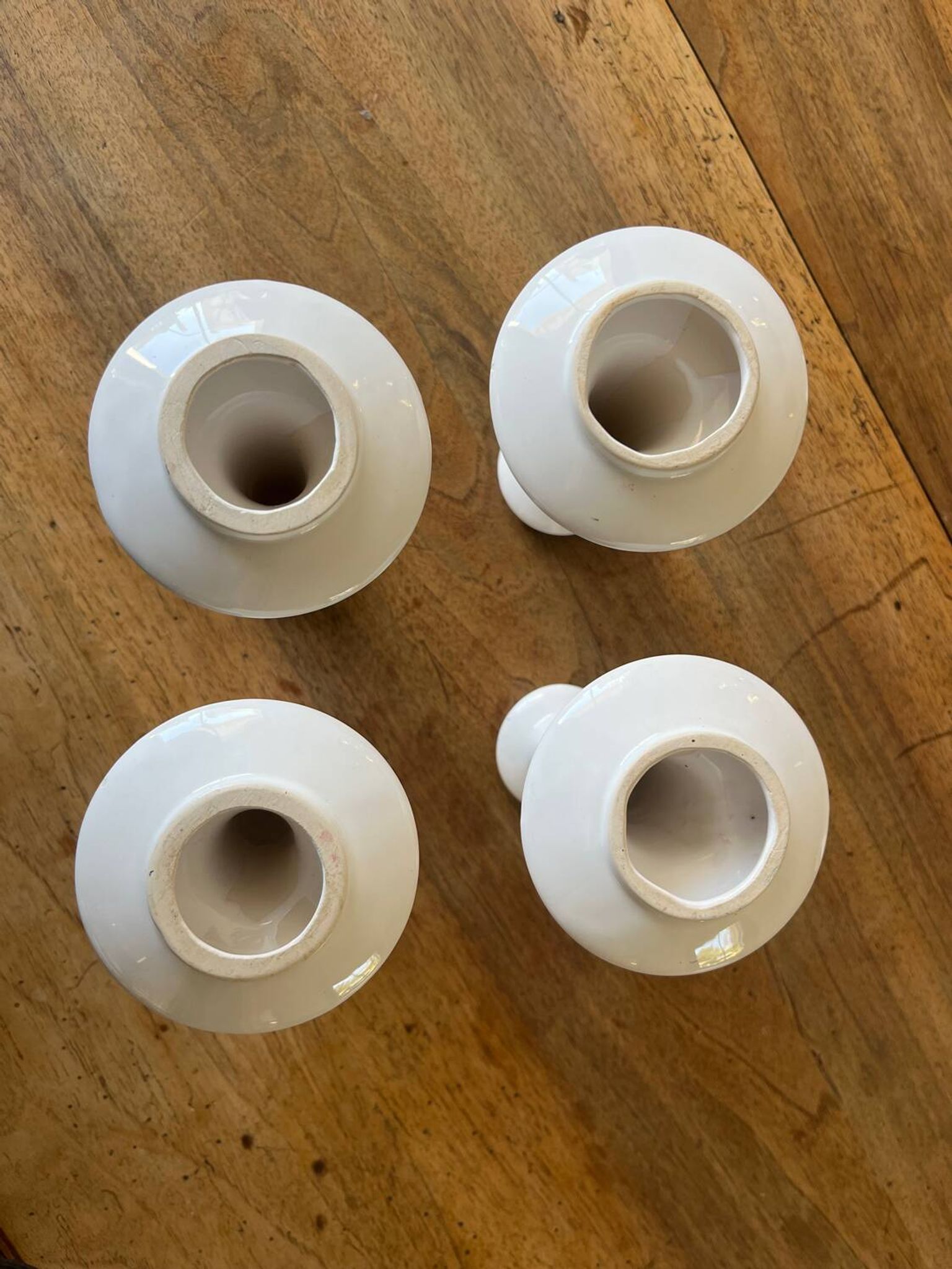 Set of 4 white ceramic candle holders