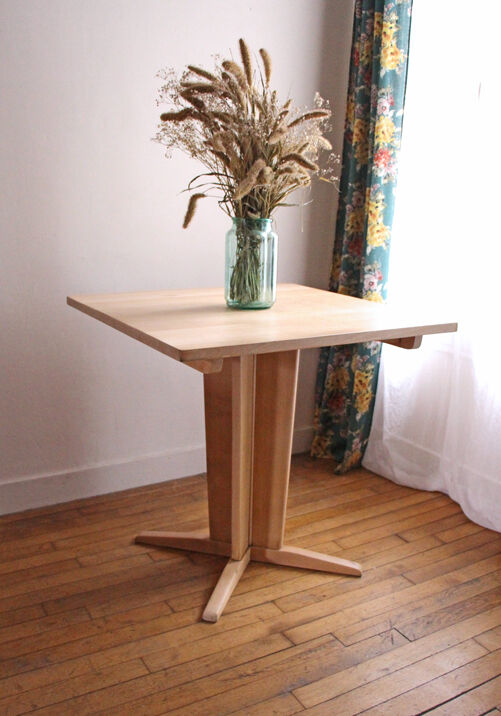 Square meal table made of solid wood