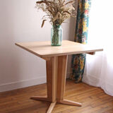 Square meal table made of solid wood