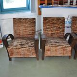 Pair of Art Deco armchairs in curved wood and multicoloured fabric from the 1920s.