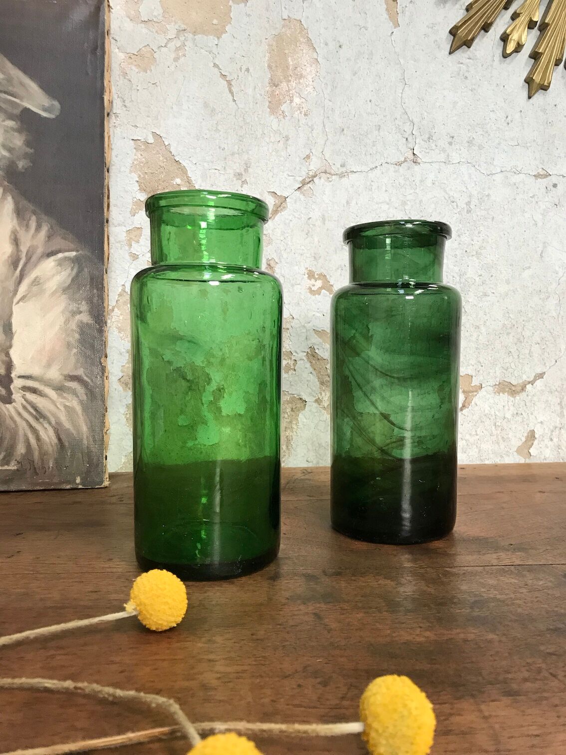 Green bubbled glass jars.