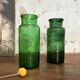 Green bubbled glass jars.