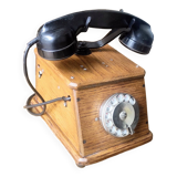 Old wooden dial crank telephone