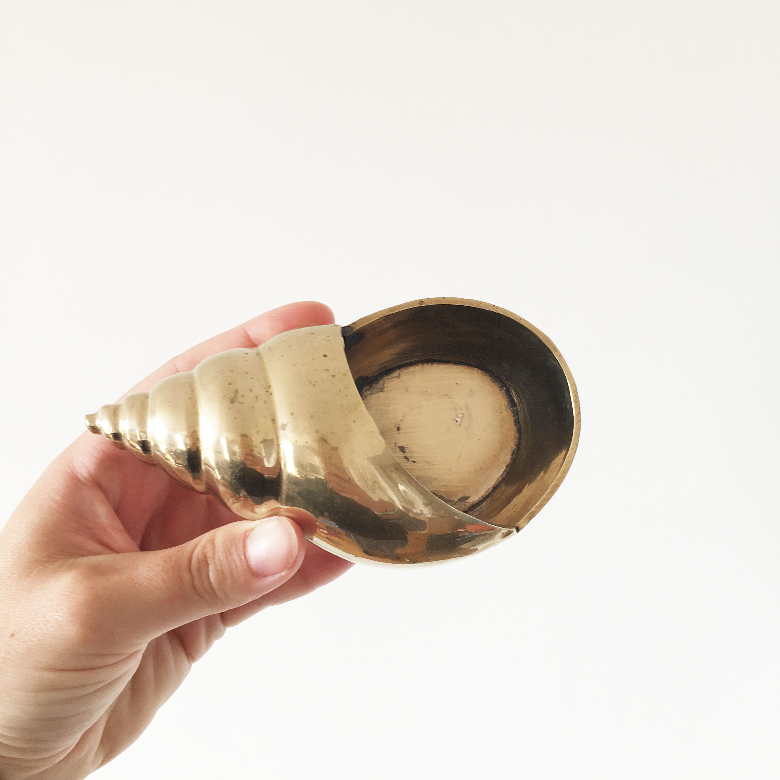 Vintage brass shell ashtray