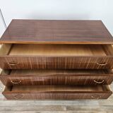 1950s chest of drawers covered in walnut with brass handles