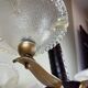 Lustre moderniste français en bois, laiton et verres opalescents