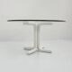 135 cm dining table with thick rounded white wooden legs and glass top, 1980