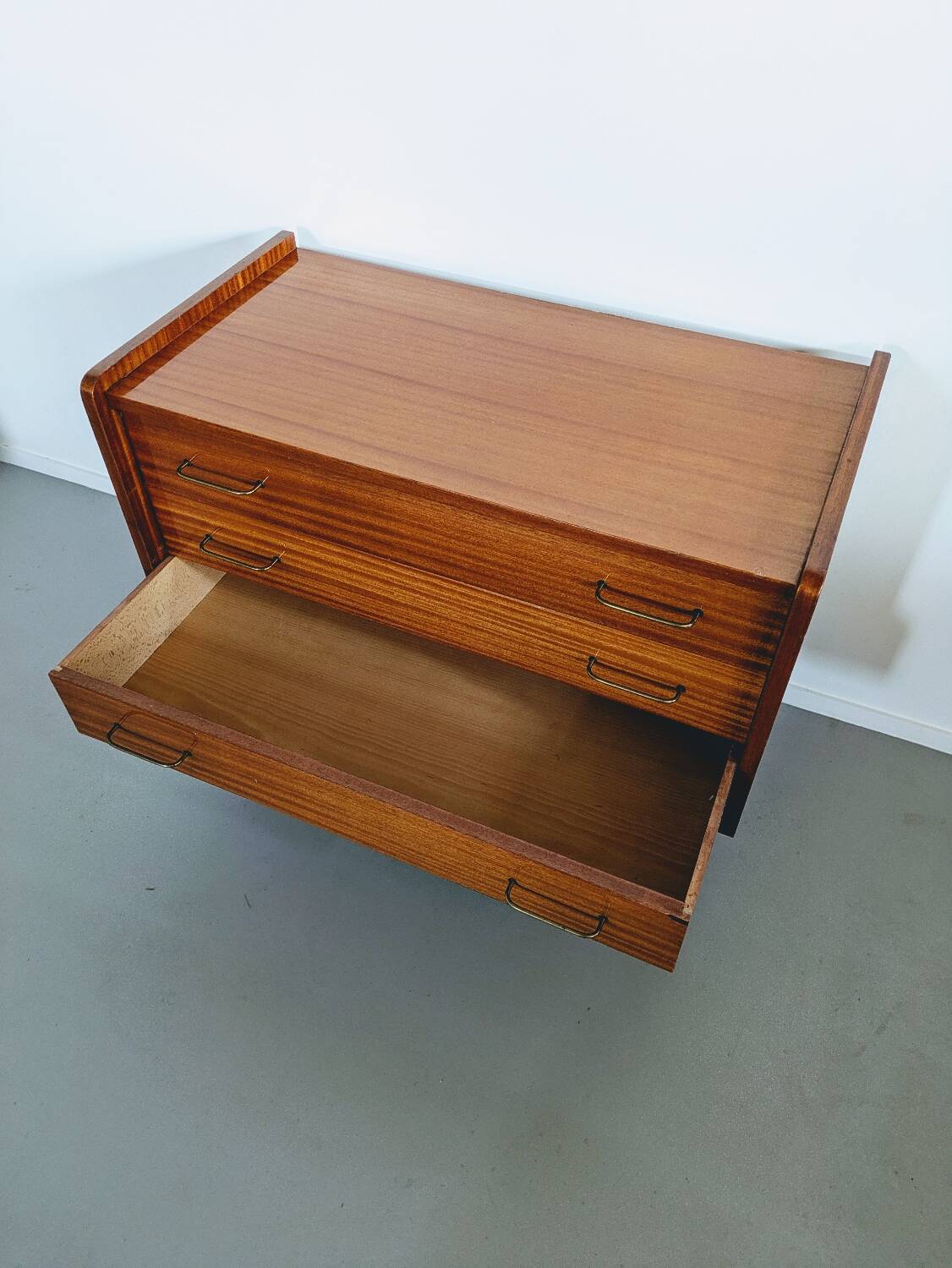 Vintage wooden chest of drawers in Scandinavian style