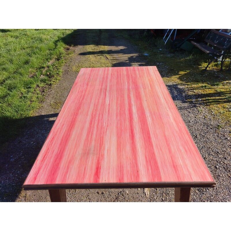 1960s oak dining table with integrated extensions.