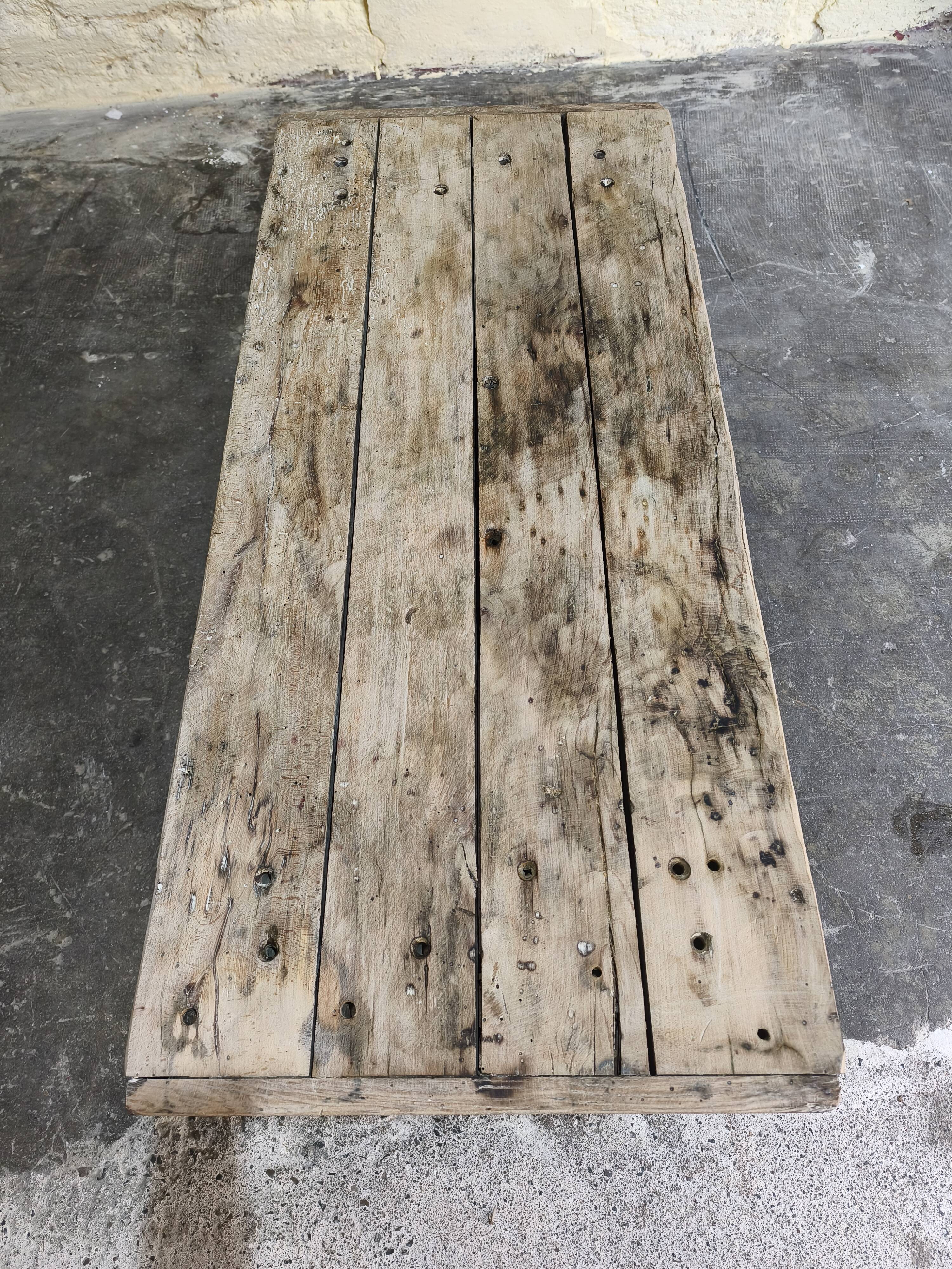 Solid oak coffee table with industrial cast iron legs