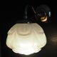 Brass wall lamp and white glass globe from the 1950s-1960s.