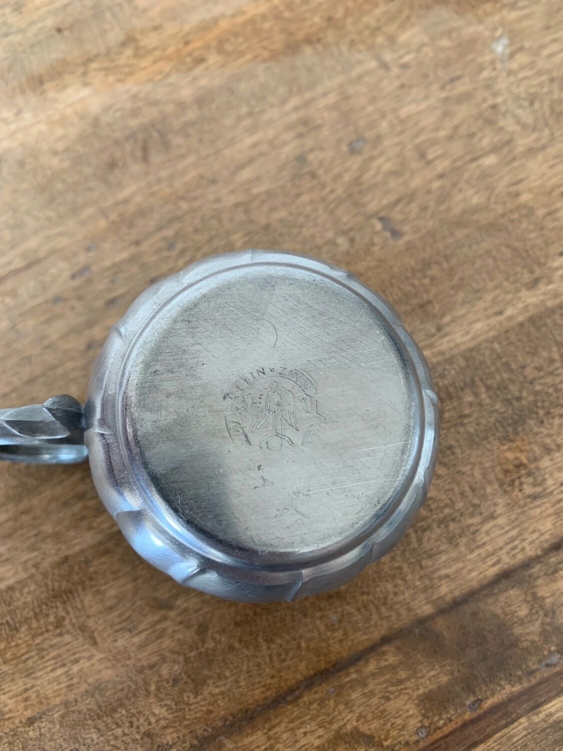 2 small porcelain cups and their pewter cup holders