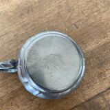 2 small porcelain cups and their pewter cup holders