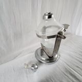 Tilting soap dispenser