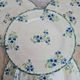 Set of 4 antique dessert plates in ironstone, with blue and green floral decoration.