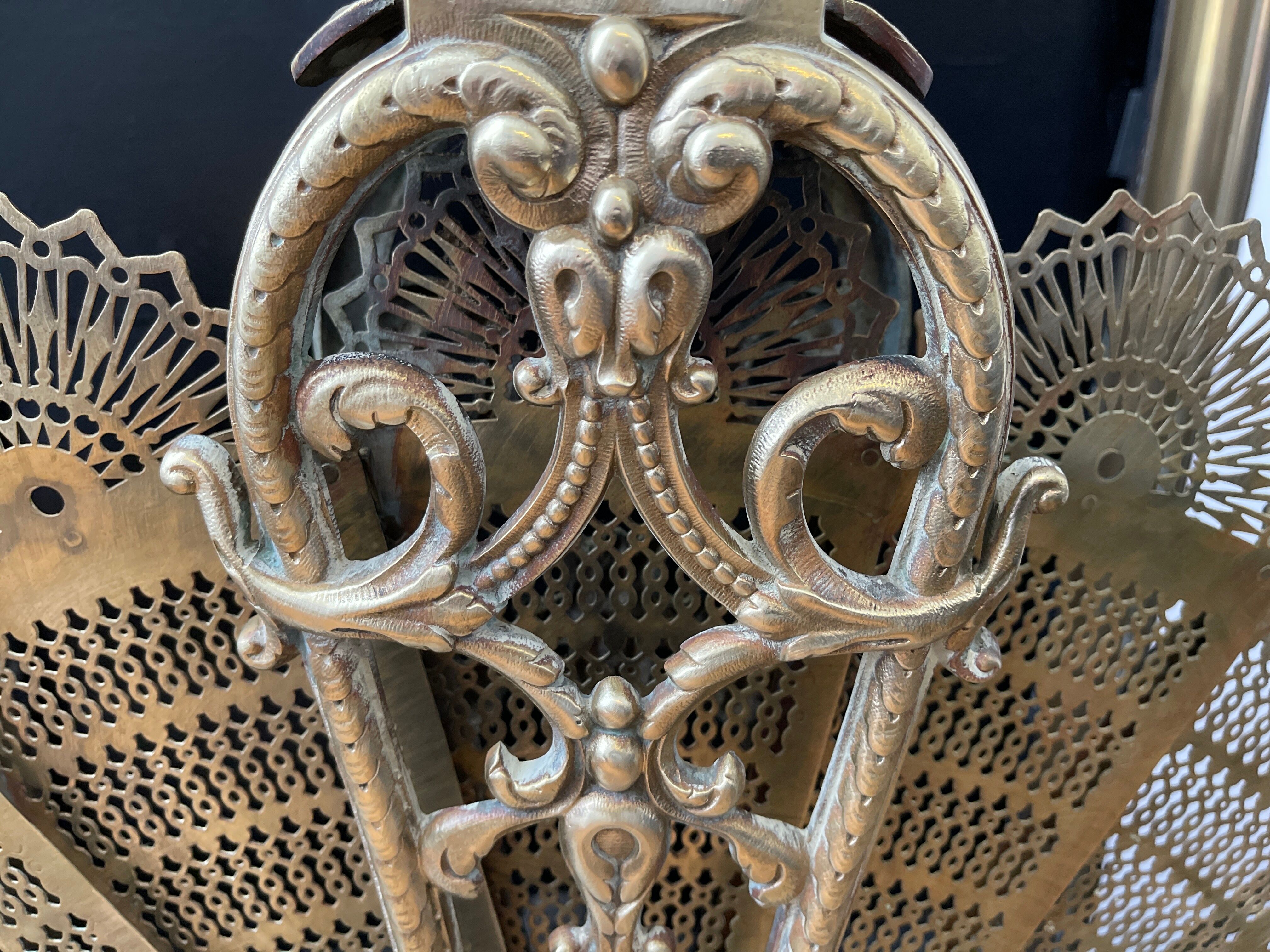Old bronze fire firewall Napoleon 3 peacock tail fan and Vulcan head
