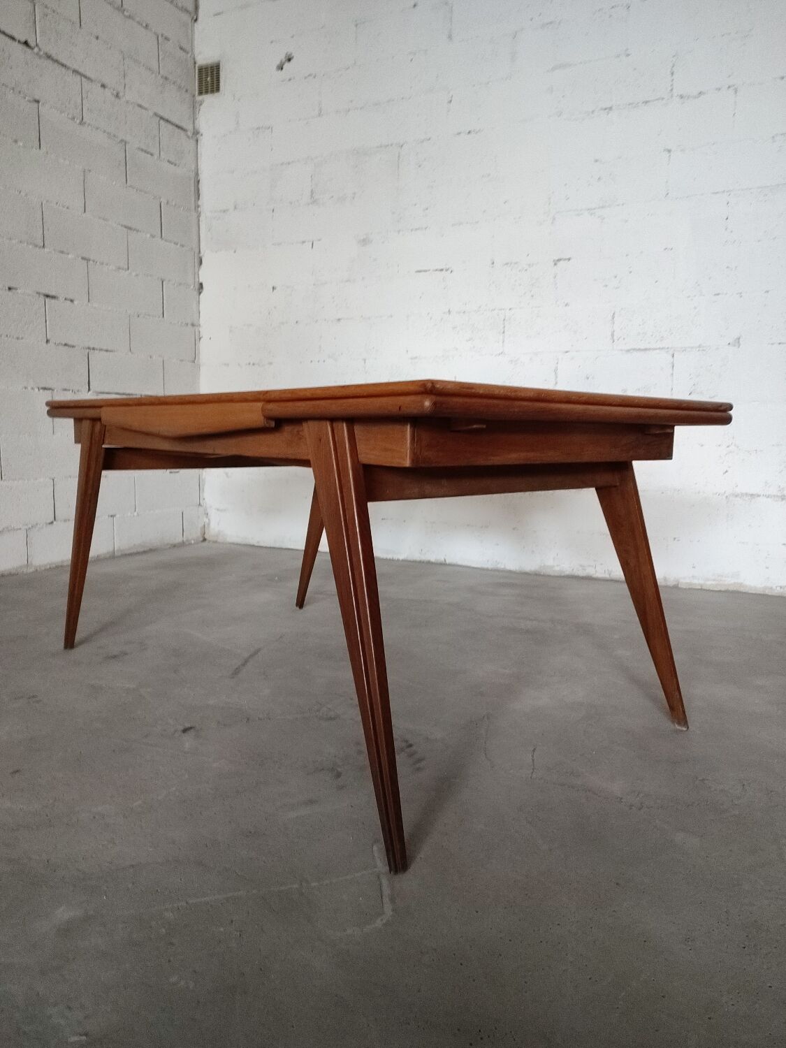Vintage compass foot dining table