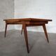 Vintage compass foot dining table