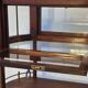 Art Deco service trolley in mahogany, brass, and glass, 1920.