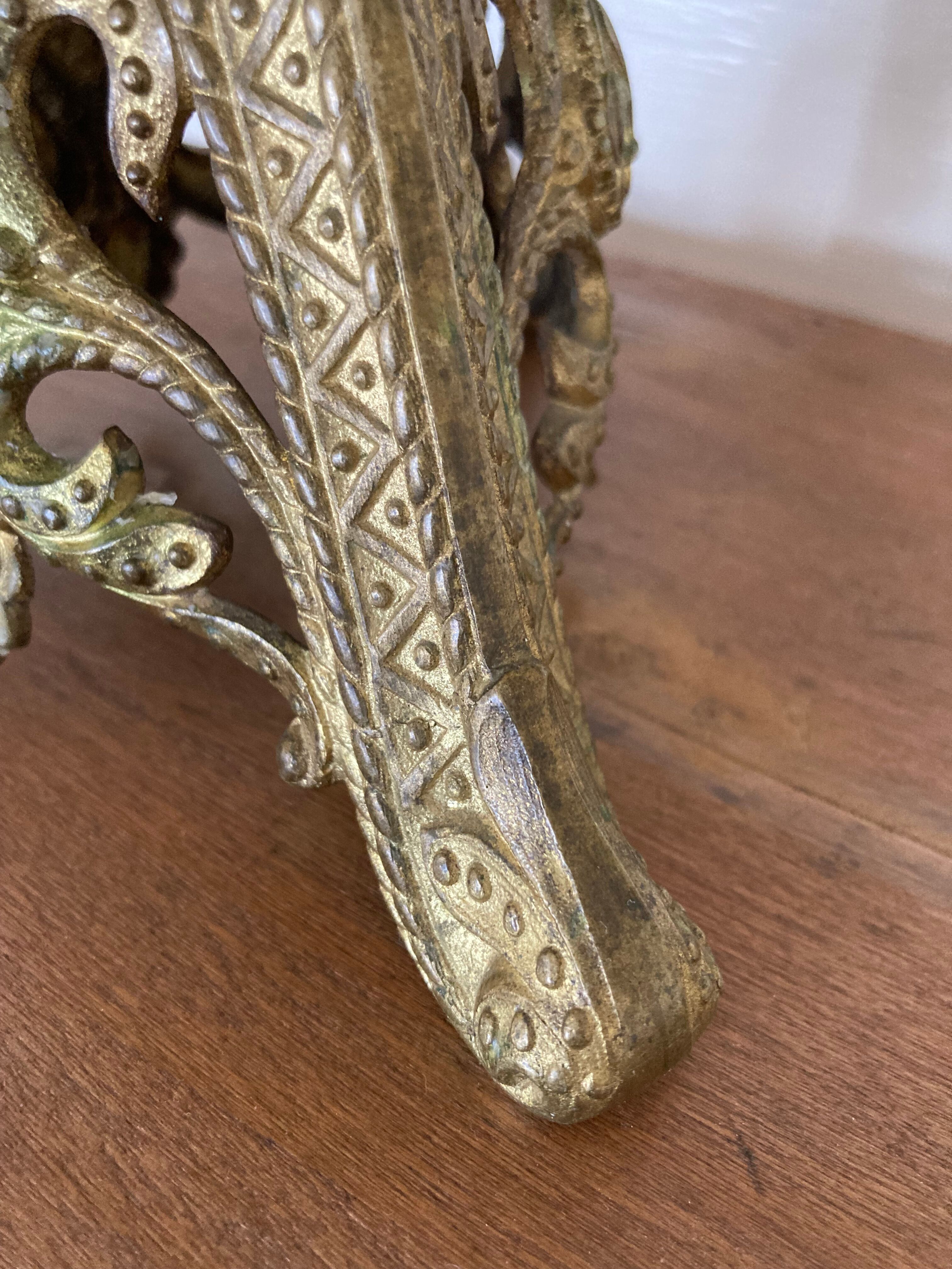 Candle holder church in gilded metal