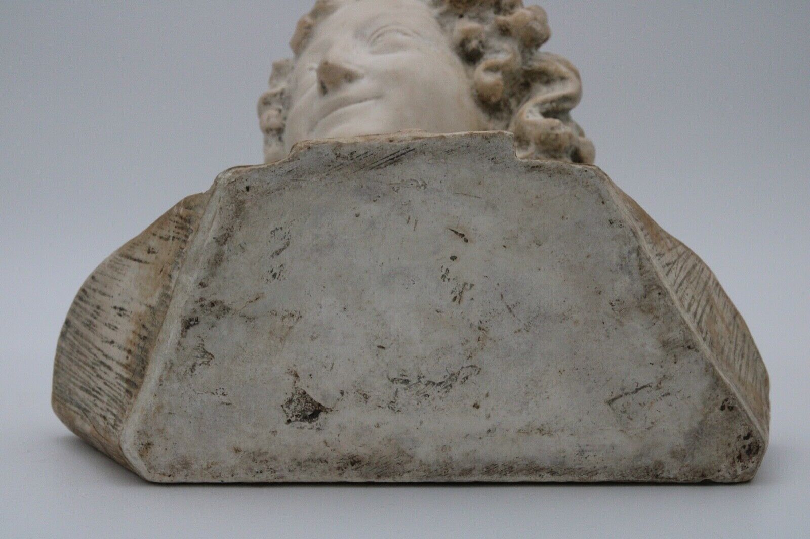 Bust in flat woman renaissance late 19th hair drapes