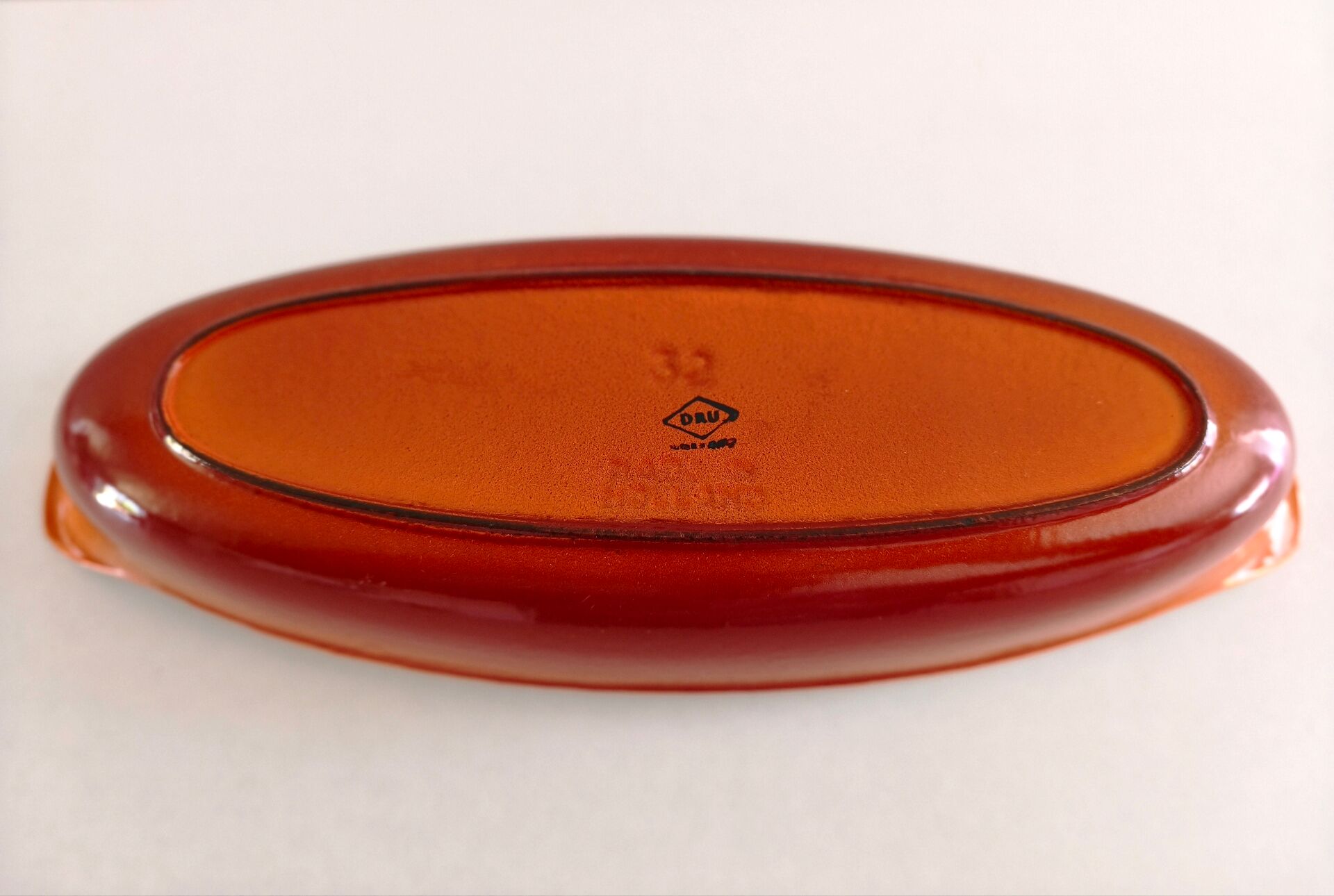 Enamelled cast iron baking dish of the Le Creuset type.