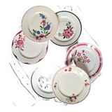Old mismatched earthenware dinner plates
