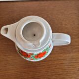 Small vintage coffee or teapot with orange flower pattern
