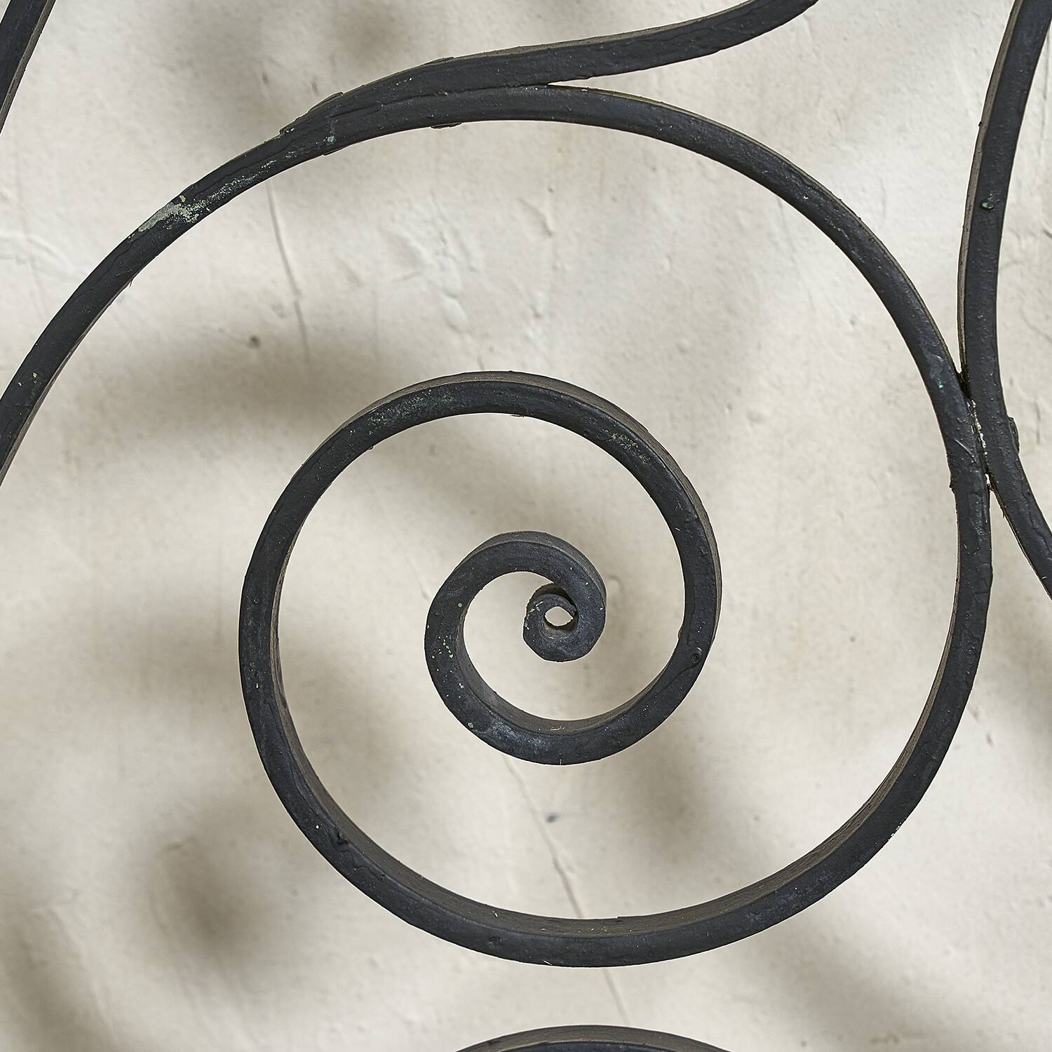 Arched wrought iron gate