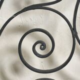 Arched wrought iron gate