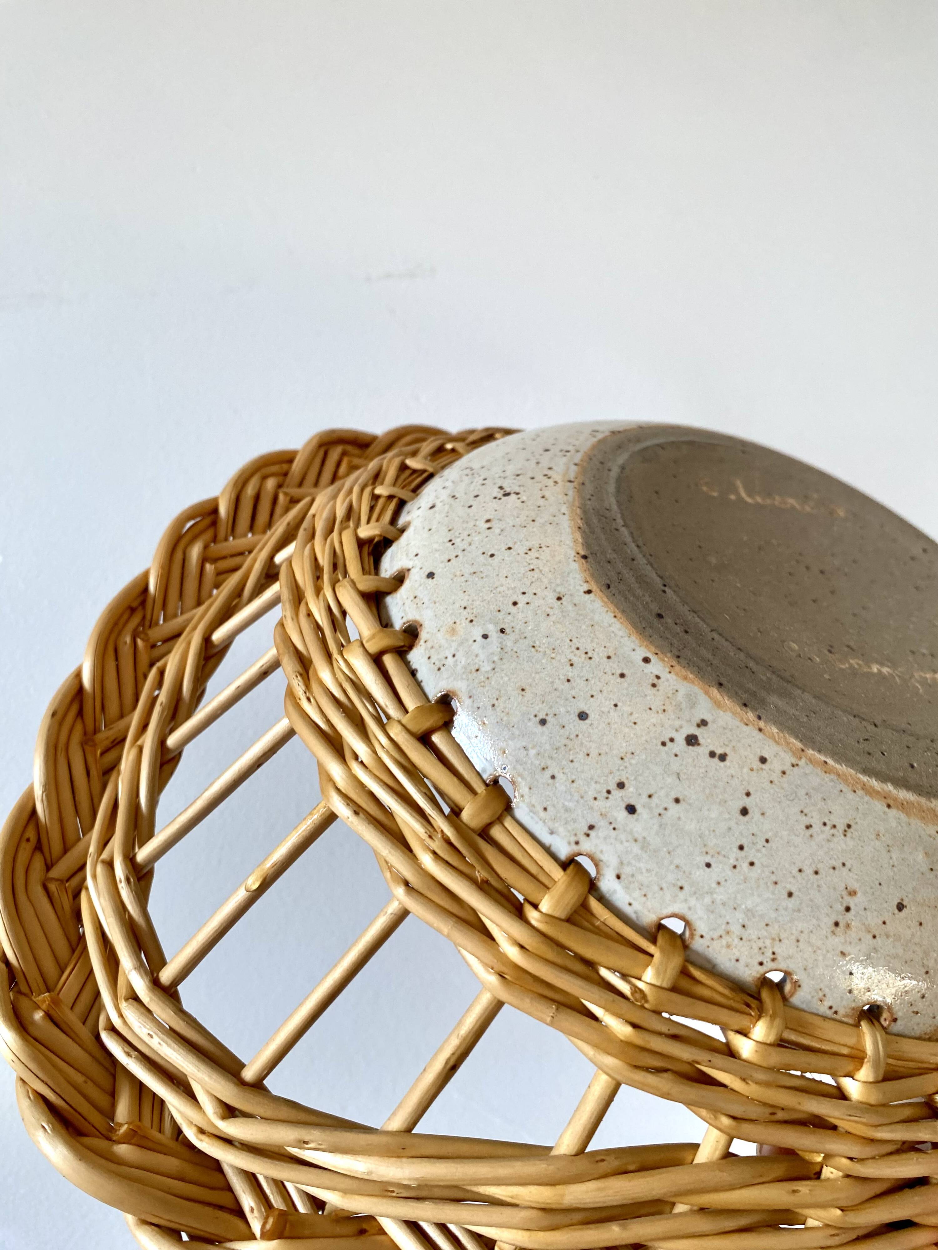 Wicker and ceramic piece signed, 1990s.