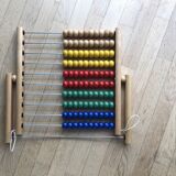 Vintage abacus in wood and primary colors