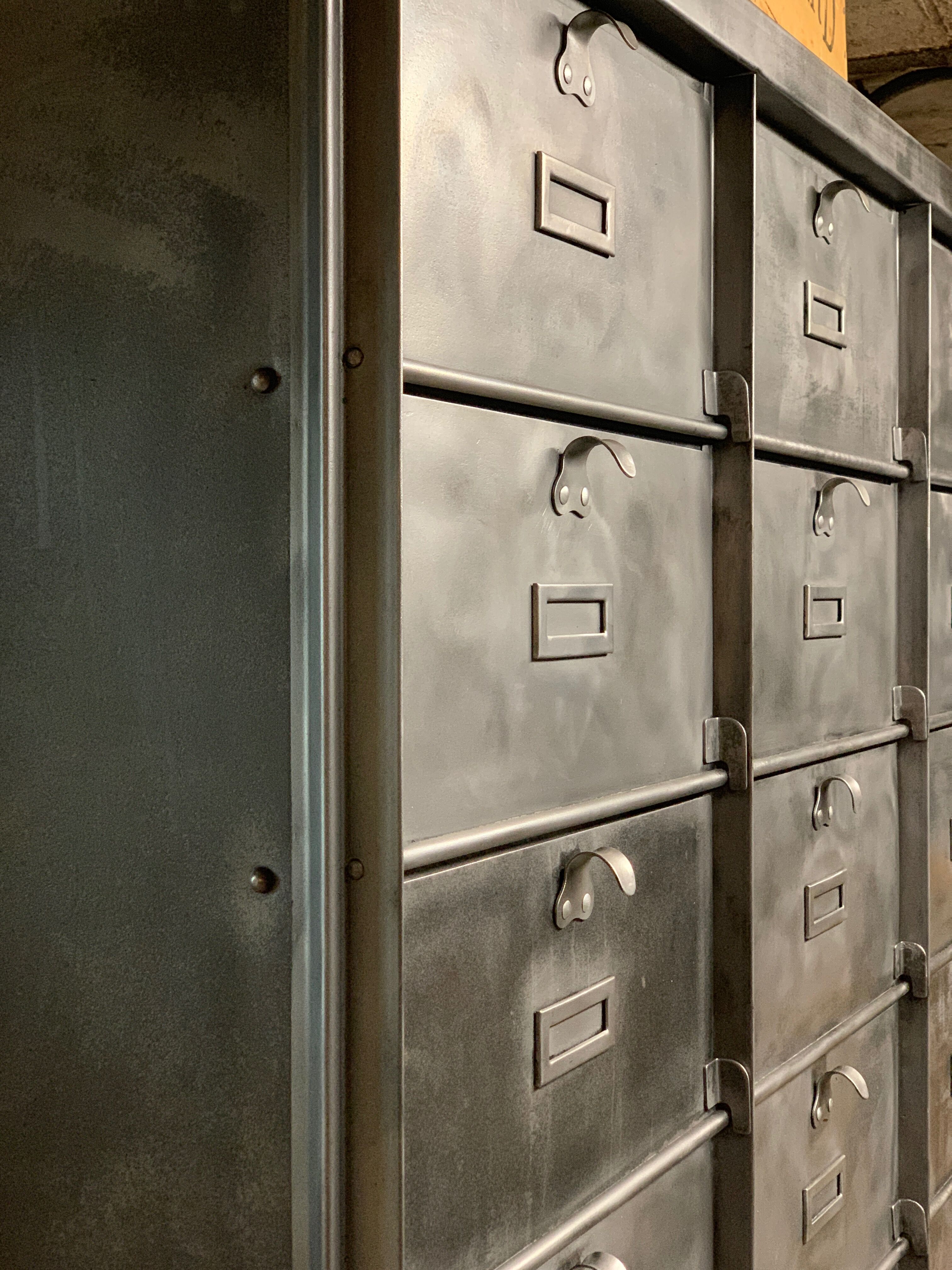 Industrial cladding furniture in brushed and patinated steel