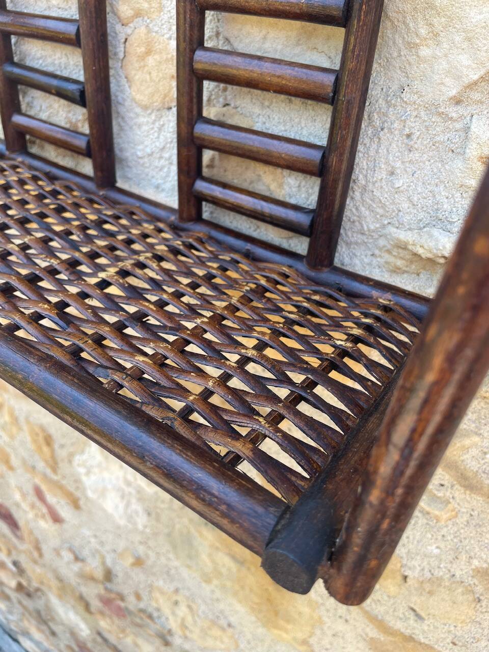 Vintage wall shelf in bamboo and rattan, circa 1960s.