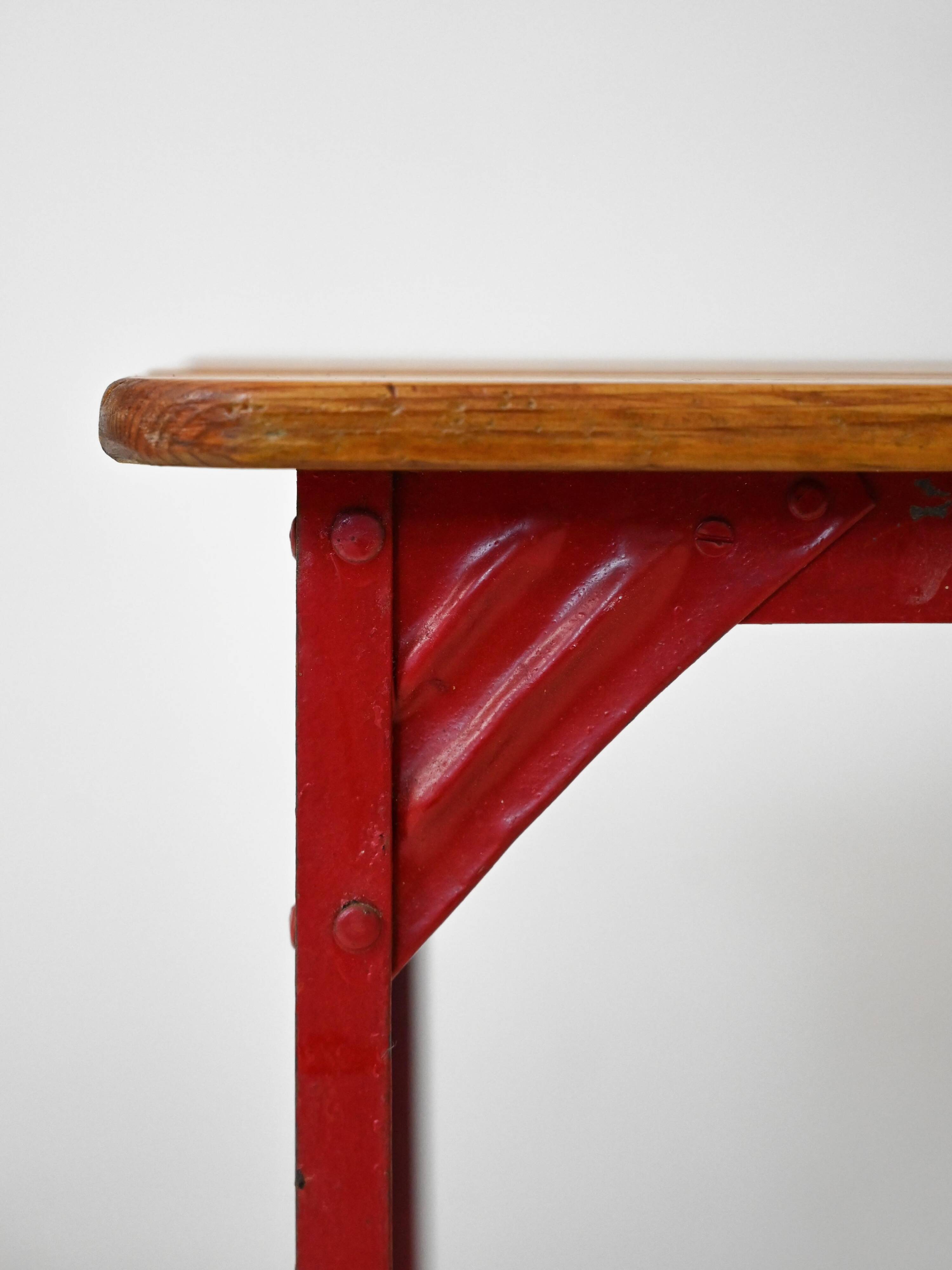 Pair of red metal and wood stools