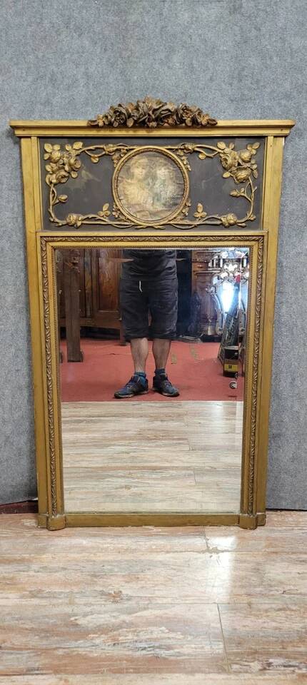 Louis XVI style trumeau mirror in wood and gilded stucco circa 1880