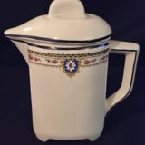 Vintage vase, geometric frieze and flowers with a black border.