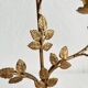 Antique bronze and brass candlestick with golden leaves