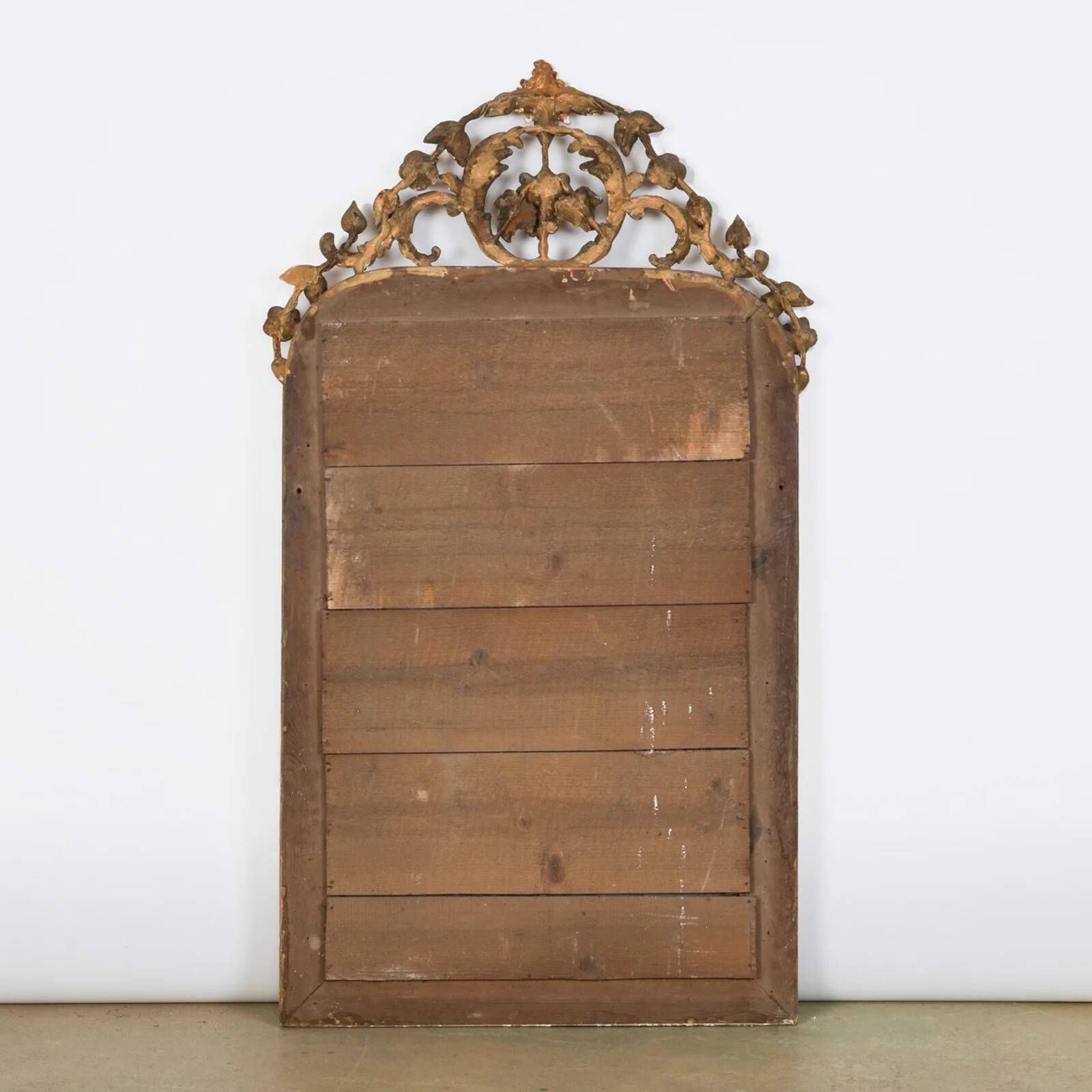 Louis-Philippe mirror from the 19th century with foliage and grape cluster motifs.