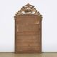 Louis-Philippe mirror from the 19th century with foliage and grape cluster motifs.