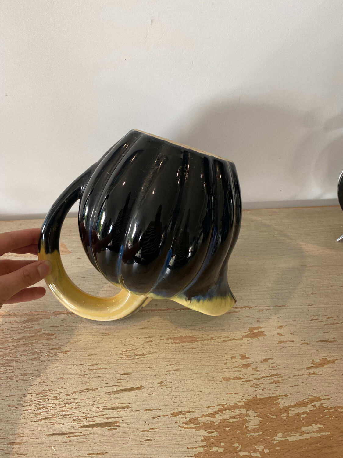 Bowler pitcher handle deported