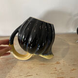 Bowler pitcher handle deported