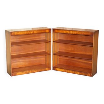 Pair of open dwarf bookshelves in mahogany by Shaws of London.