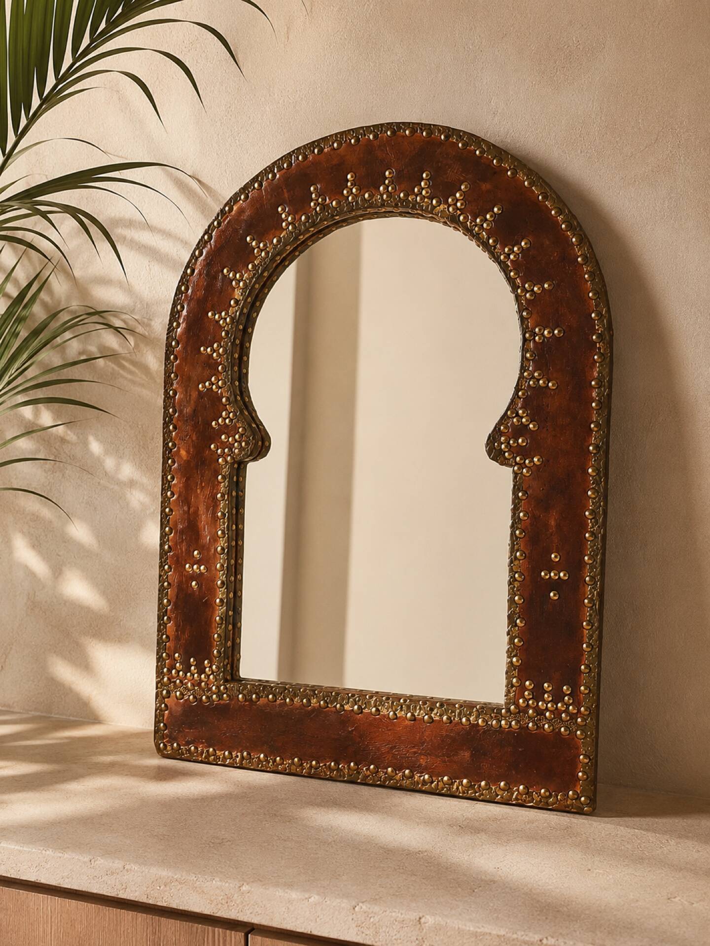Large vintage mirror in studded leather and brass