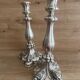 Paire de bougeoirs flambeaux en argent massif poinçon licorne, début XIXème